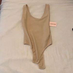 Brand new bodysuit